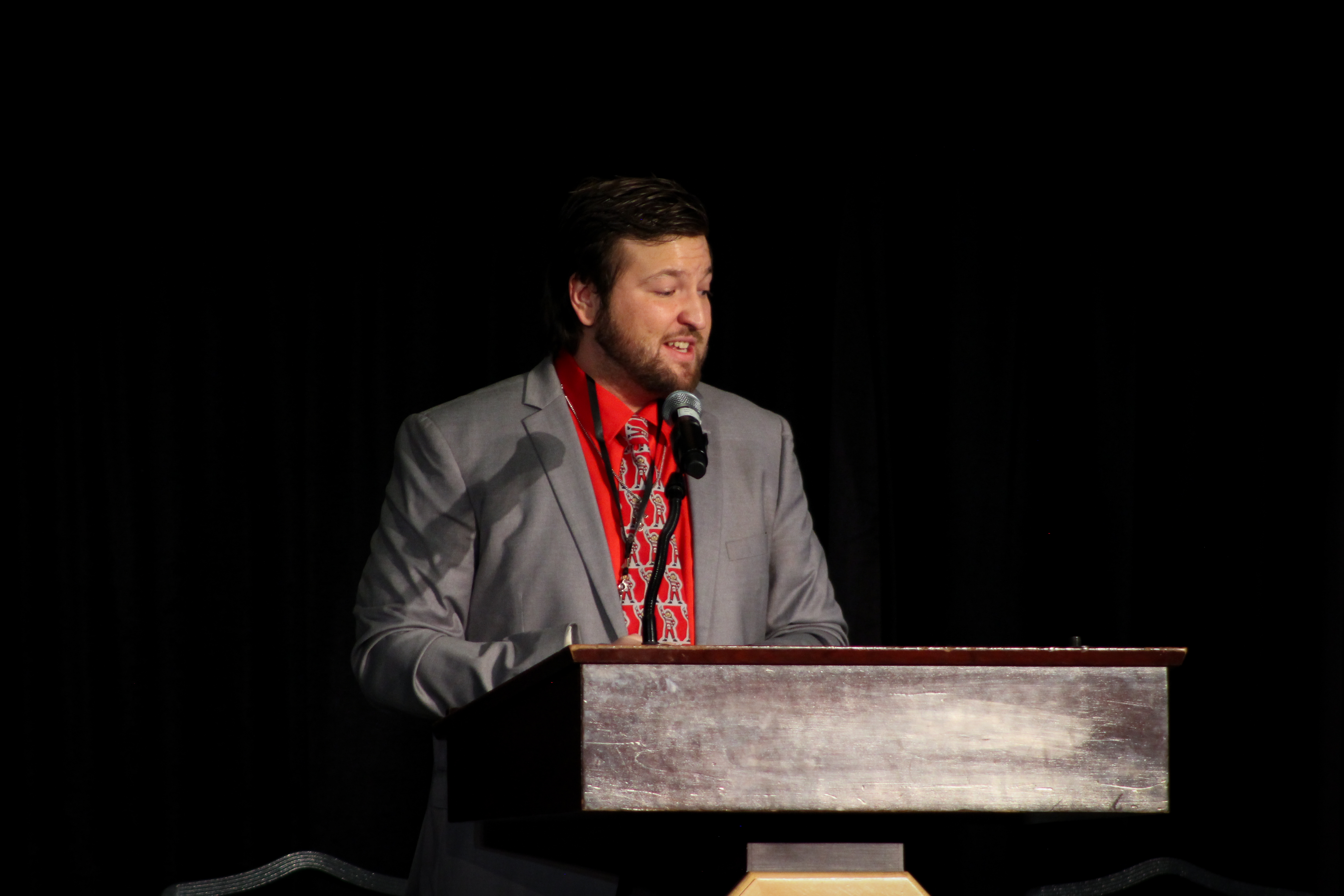 John Carl Barba the second, standing at the podium