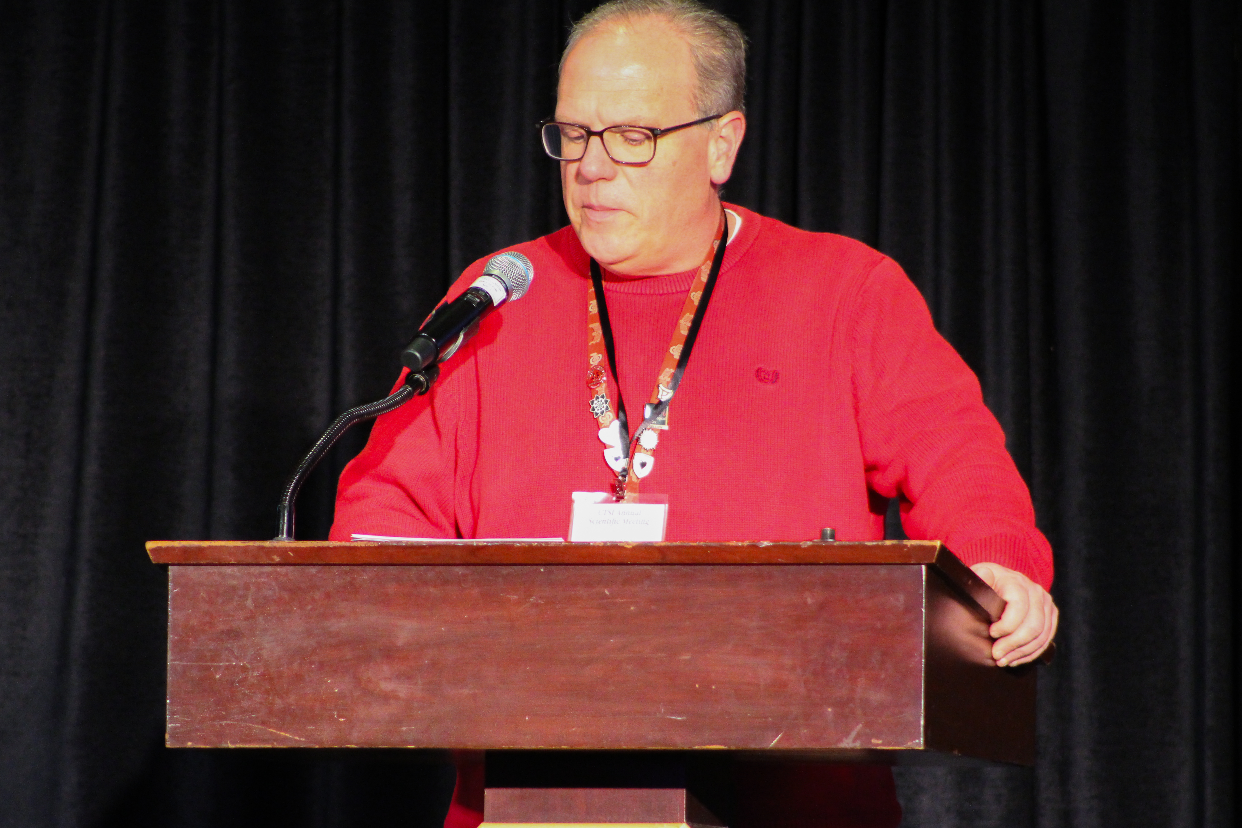Lorem Wold speaking on podium