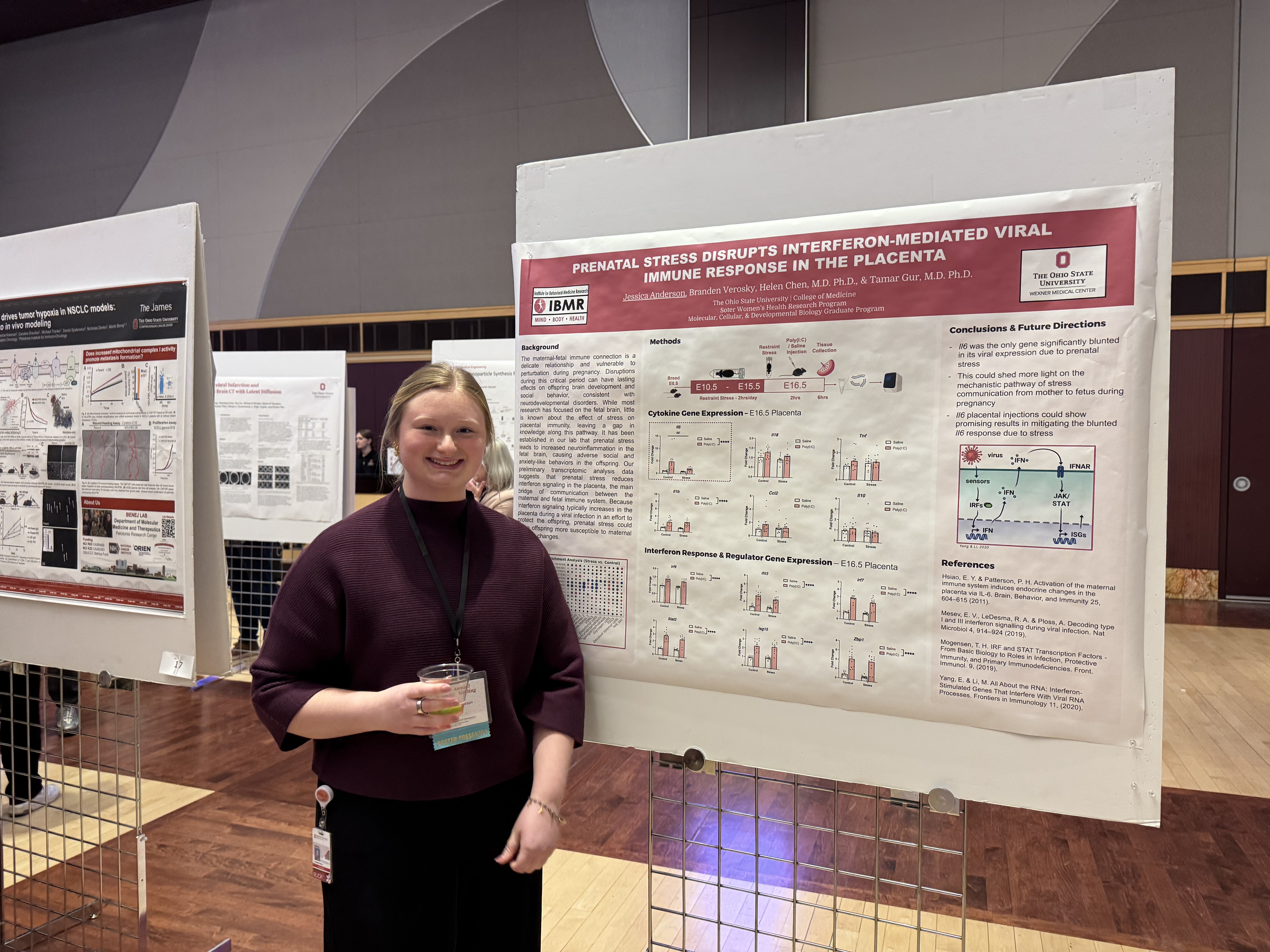 female poster presenter with poster