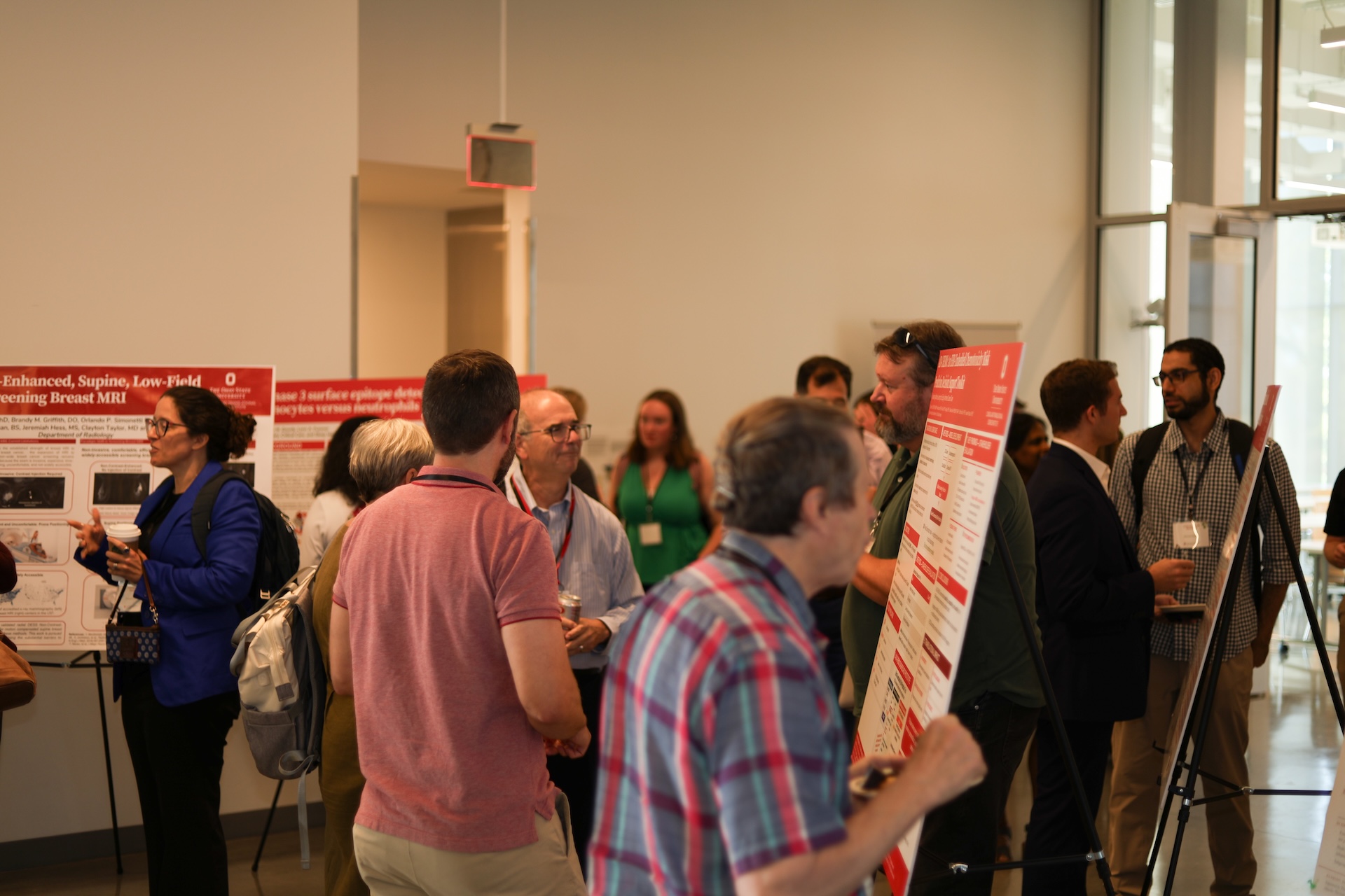 attendees eating and talking during poster session