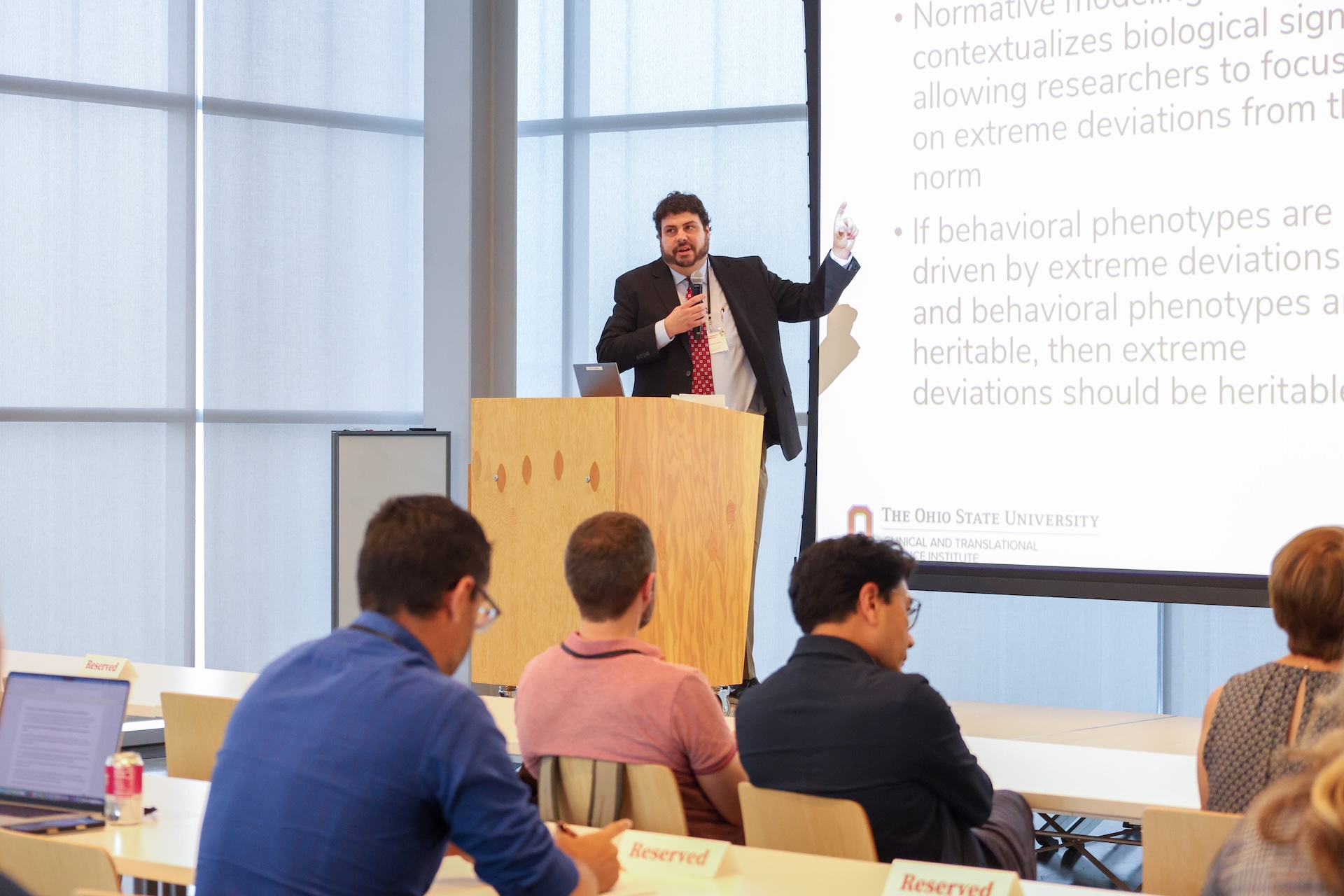 Dr Edward addressing attendees at the research showcase