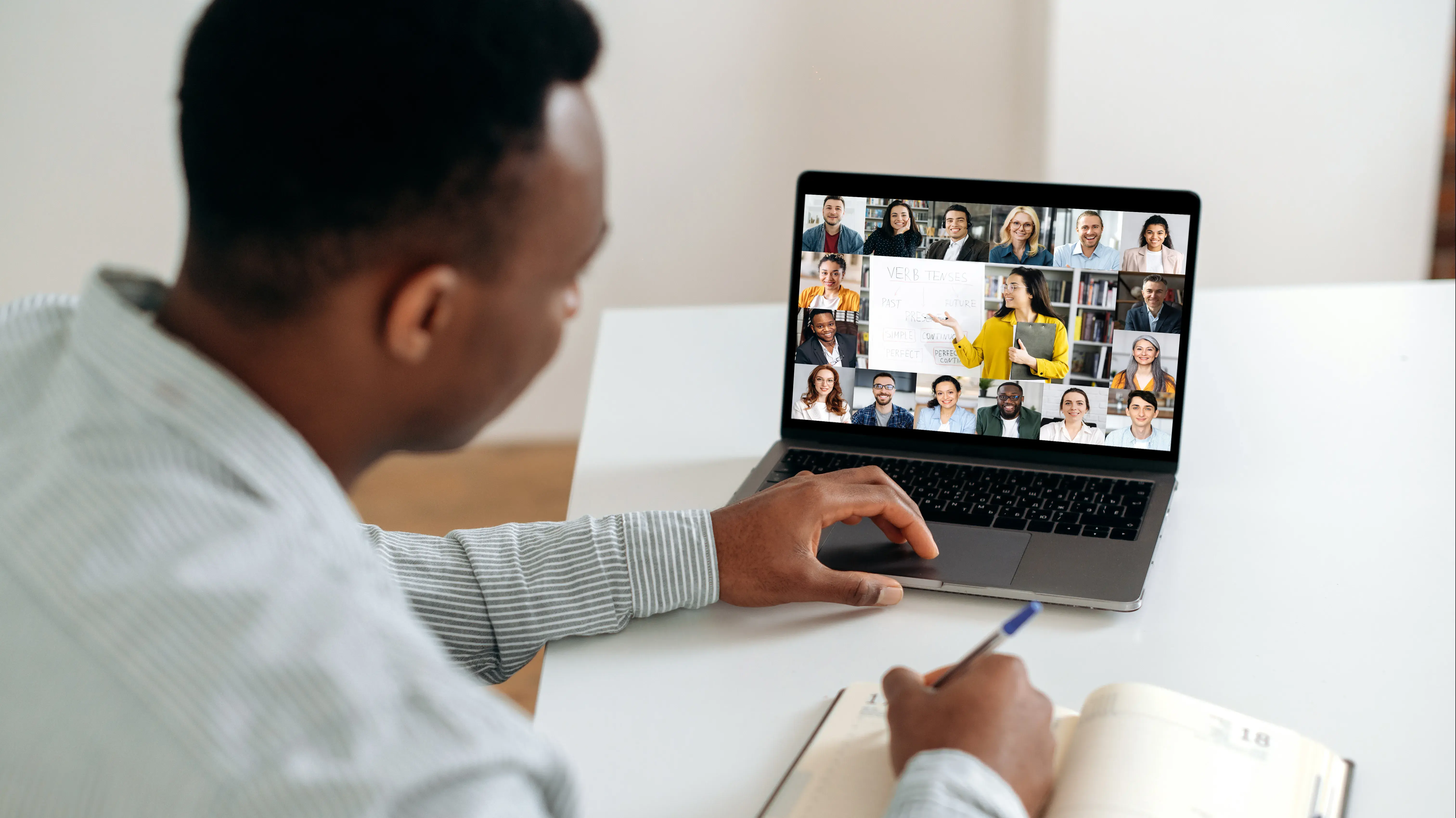 Person sitting through a virtual meeting